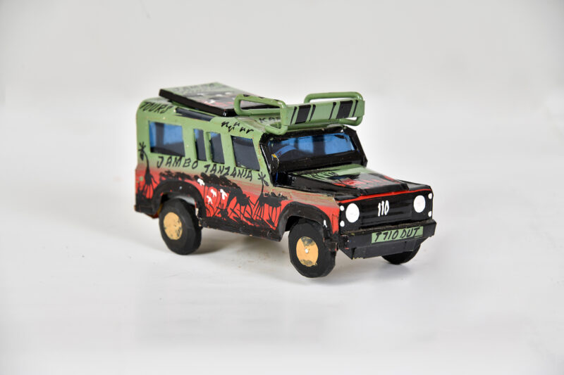 A Hand Painted Tin Safari Car