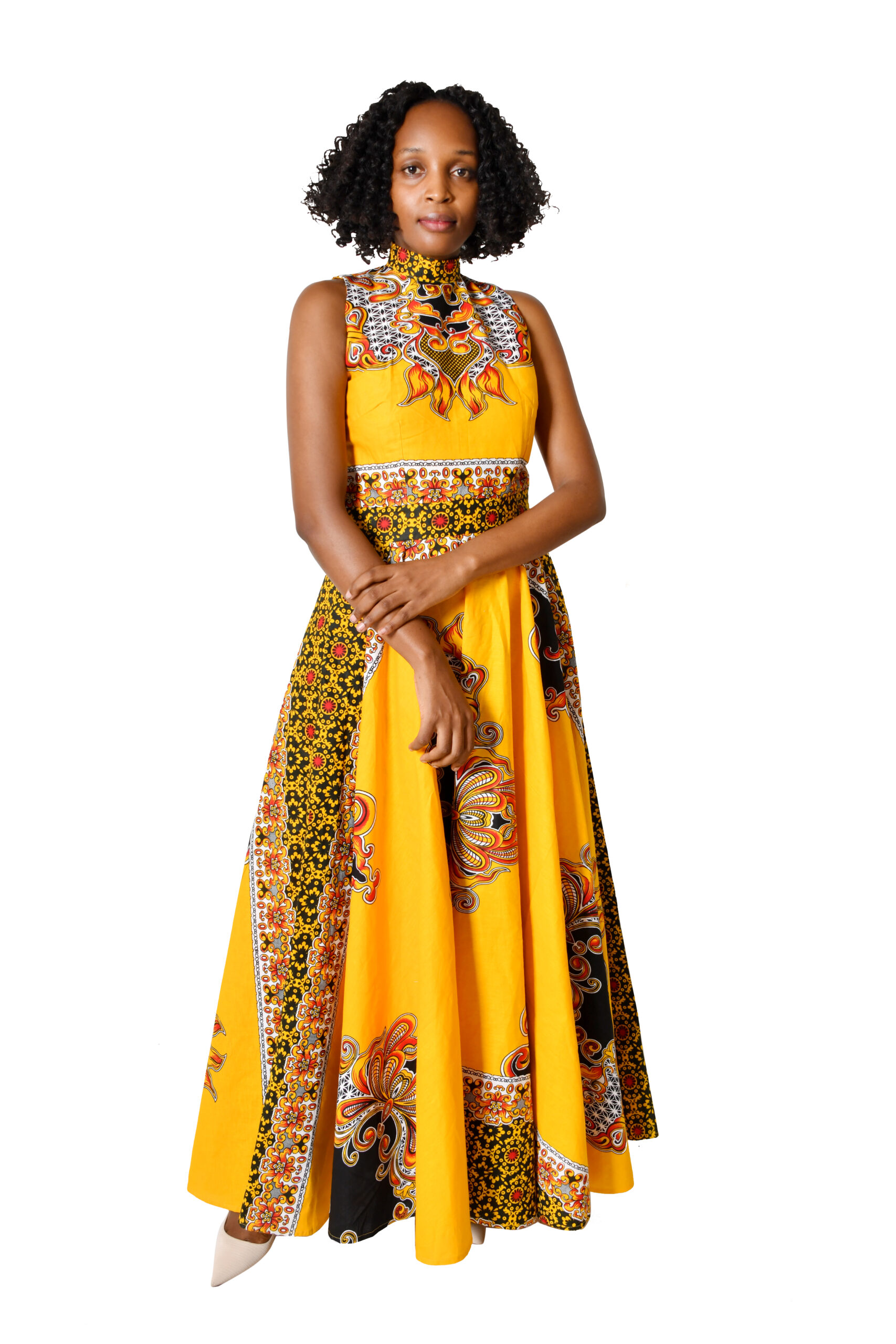 A stunning African Maxi Dress, showcasing vibrant prints ideal for modern Kente-inspired wedding looks.